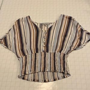 Striped linen shirt with ribbed waist